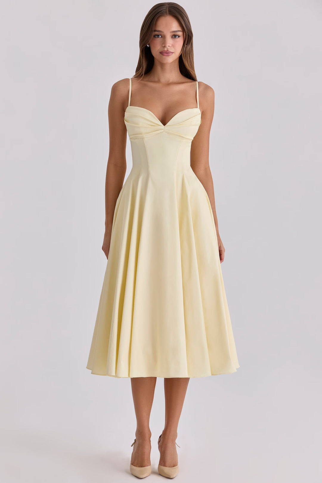 Elegant women's gathered bust midi dress in a flowy fabric, perfect for effortless summer style & vacation.
