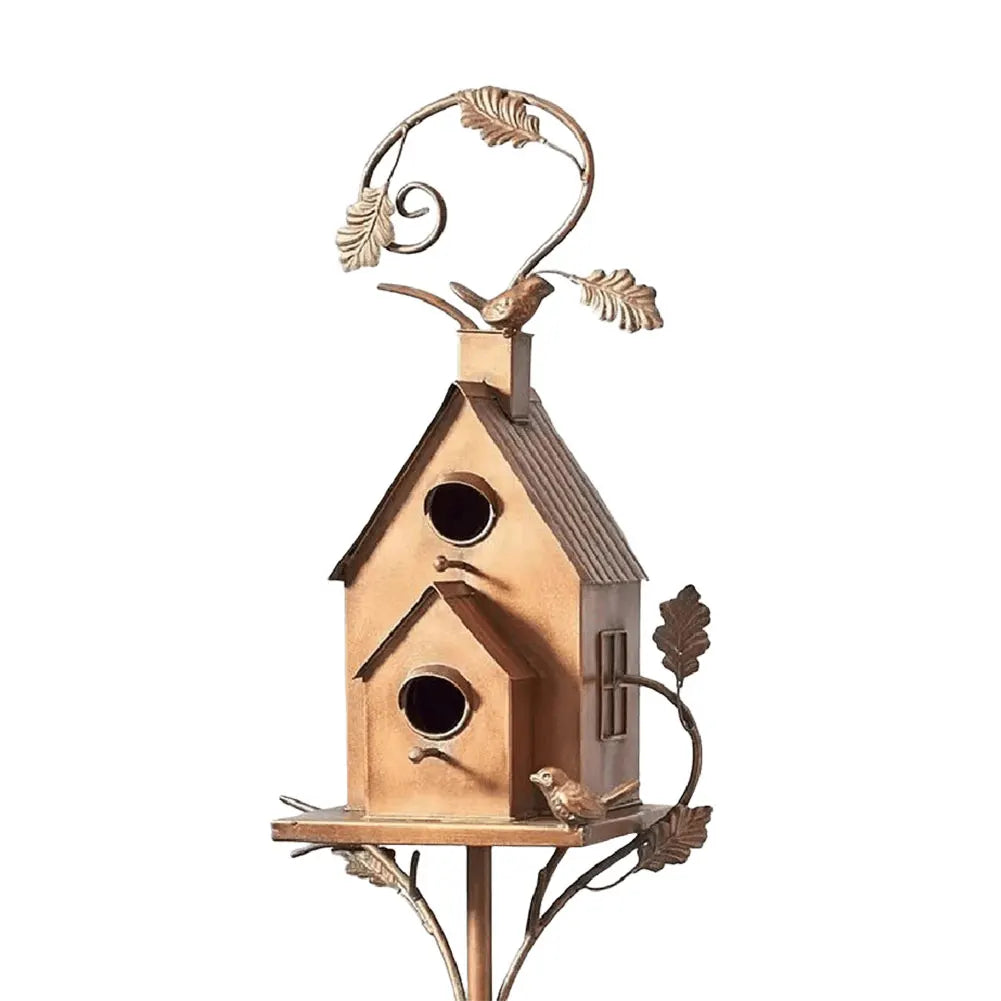Elegant metal garden birdhouse, enhancing outdoor decor and creating a cozy bird home.