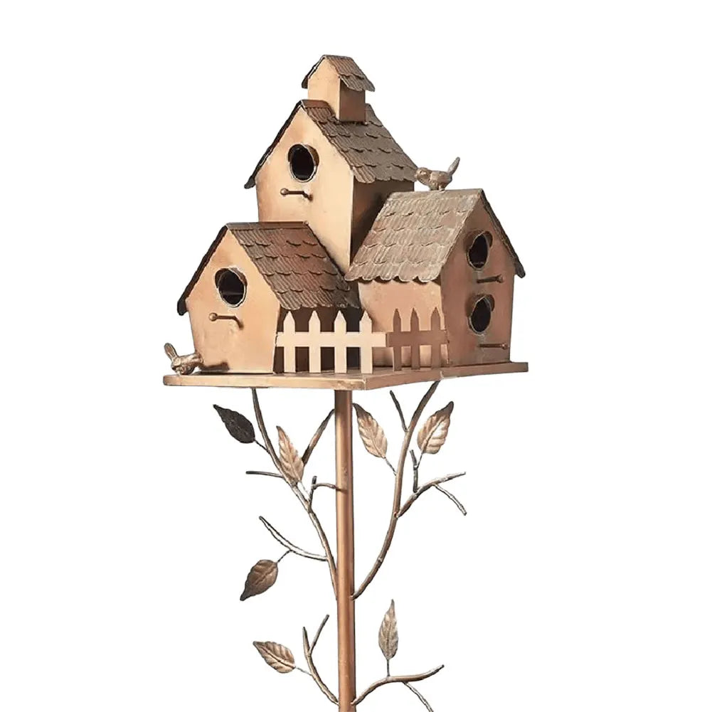 Crafted metal birdhouse with double entry, perfect garden decor for any outdoor patio.
