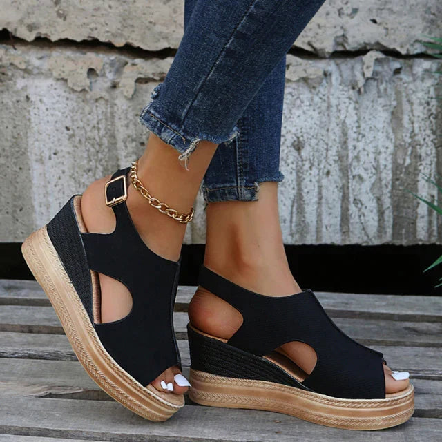 Elegant pink platform sandals for women, comfortable and stylish summer footwear for warm weather.