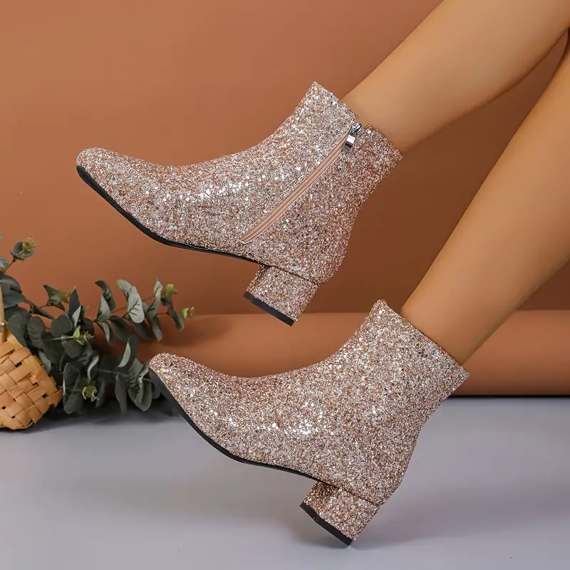 Glamorous women's shimmering ankle boots with block heel, perfect for evening wear, parties, and special occasions.