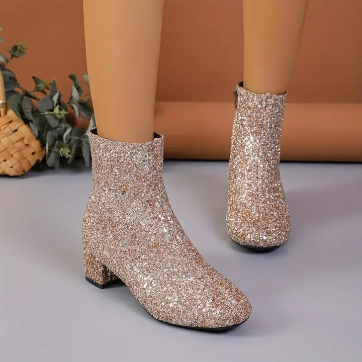 Chic women's glitter ankle boots with a stable block heel, offering glamorous style for evening elegance & party fashion.
