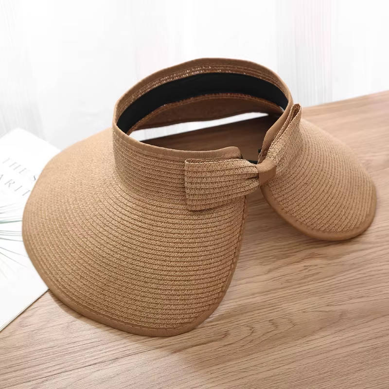Casual straw wide brim visor hat for women. Offers great sun protection, ideal for beach, travel, & summer.