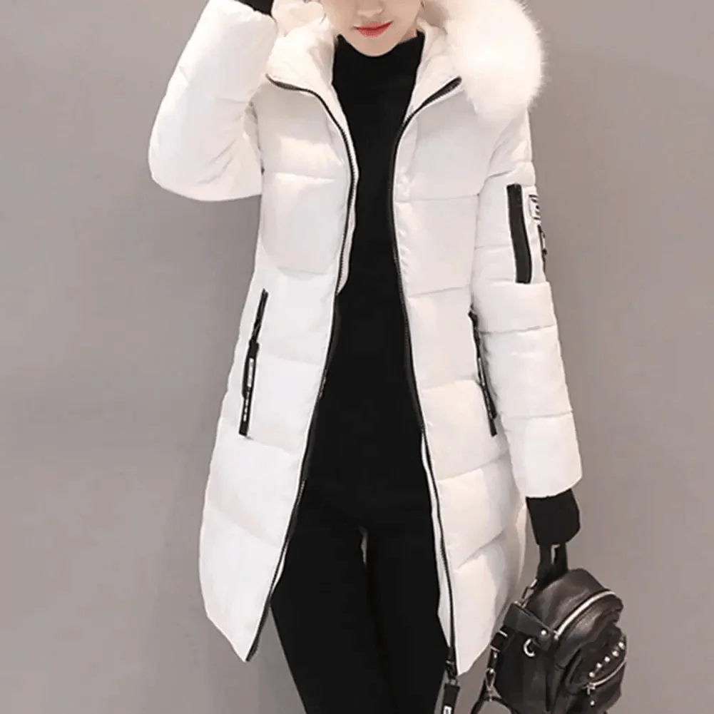 Stylish women's quilted puffer coat with a luxurious faux fur hood. Ideal warm winter jacket for cold weather fashion.