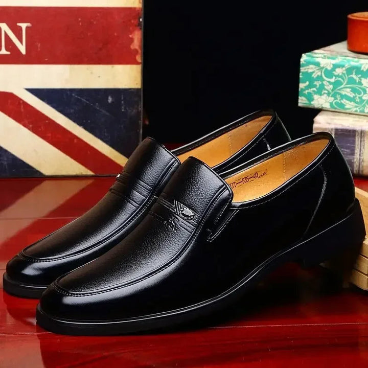 Sophisticated men's classic leather loafers. Ideal elegant dress shoes for professional settings & special events.