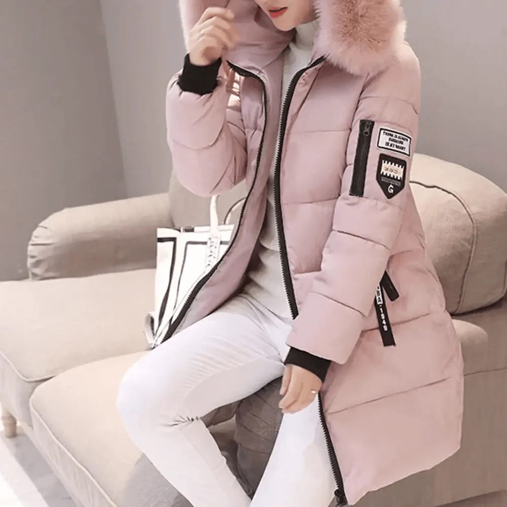 Women's cozy quilted puffer jacket with faux fur hood. Warm winter outerwear, perfect for cold weather fashion.