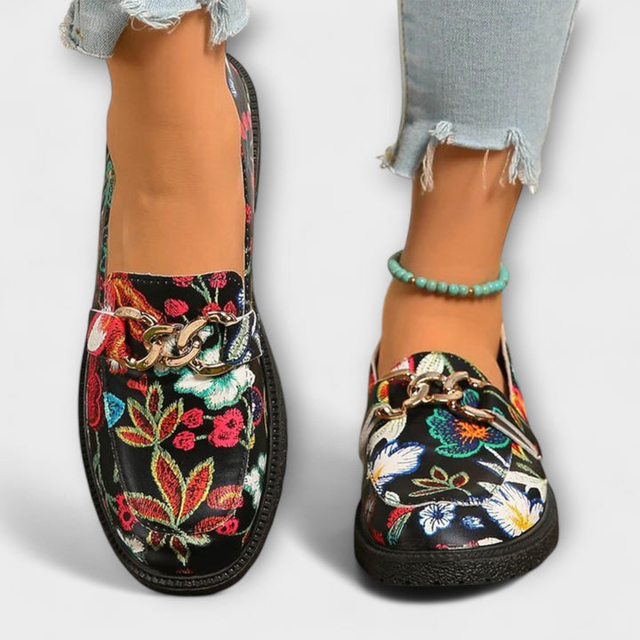 Trendy women's slip-on loafers in a bold multicolor design, perfect for casual chic and everyday wear.