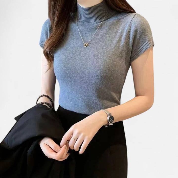 Women's Elegant Short-Sleeve Knitted Turtleneck Blouse, perfect for sophisticated versatility.