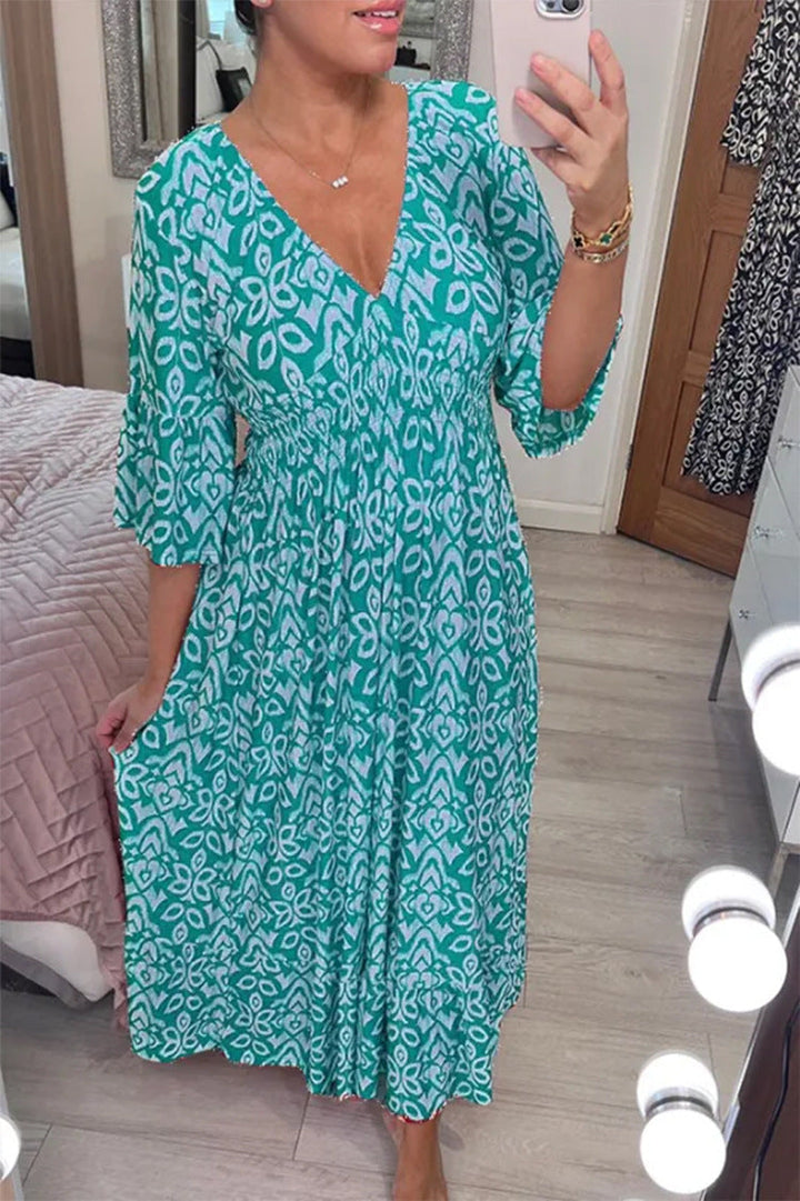 Trendy women's flowy V-neck print maxi dress, showcasing a modern and airy design.