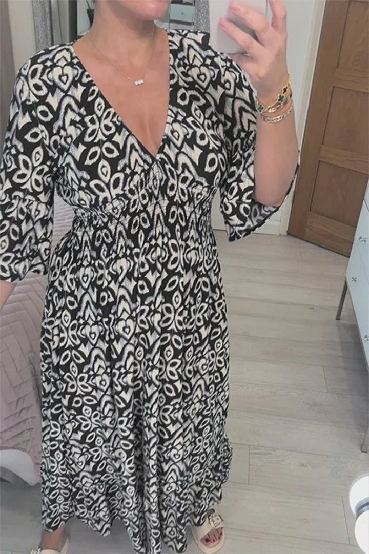 Women's summer V-neck maxi dress, a lightweight flowy print design for warm weather.