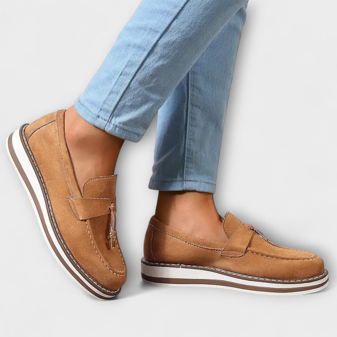 Close-up of a women's round toe loafer, showcasing classic style, comfortable design & sustainable materials.