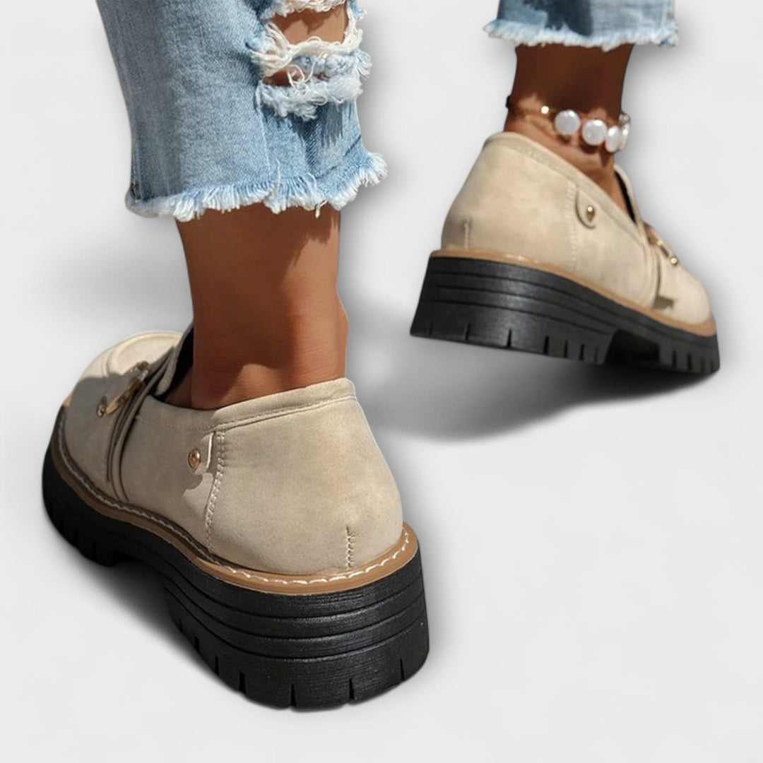 Stylish women's loafers, ideal everyday fashion footwear, easy slip-on design.