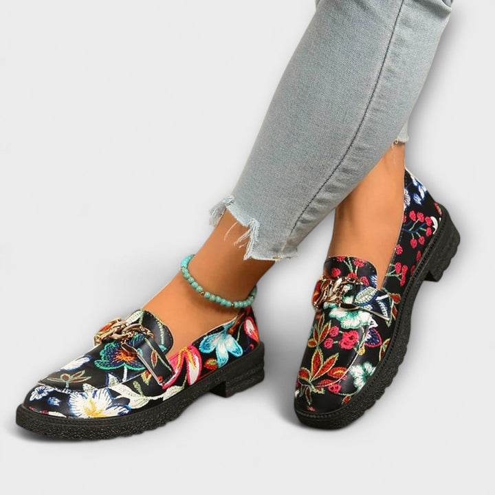 Stylish women's multicolor slip-on loafers with a bold design, providing comfortable and versatile footwear.