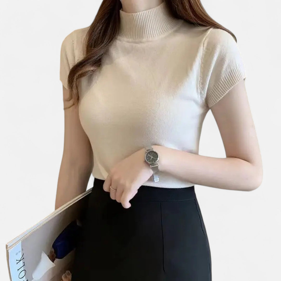 Elegant short-sleeve knitted turtleneck blouse for women, a comfortable & versatile wardrobe essential.