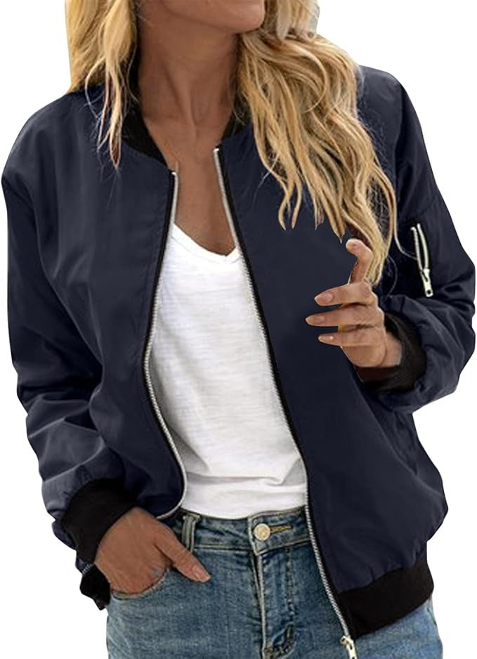 Women's light floral bomber jacket, fashionable outerwear, perfect for transitional weather style.