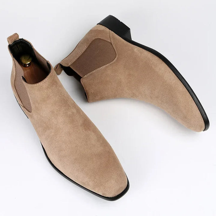Stylish men's pointed toe Chelsea boots. Easy pull-on ankle design for comfort and modern men's footwear.