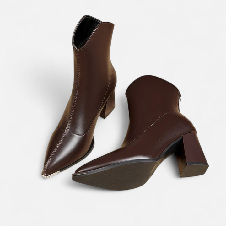 Stylish women's pointed-toe Chelsea boots, a classic and versatile ankle boot for effortless fall fashion.