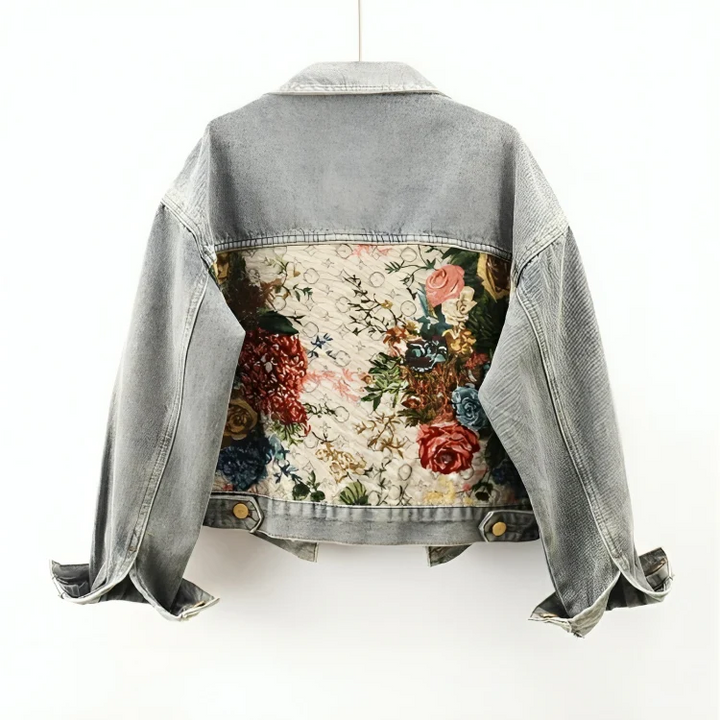 Artistic hand-painted floral denim jacket for women. Unique, versatile casual wear for everyday style.