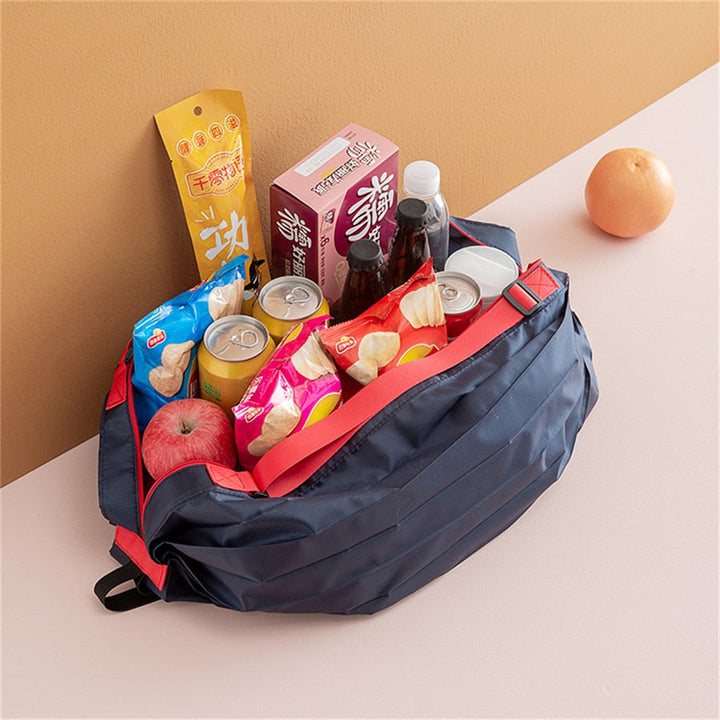 Spacious Oxford fabric women's tote bag, foldable for easy storage, ideal for everyday shopping trips.