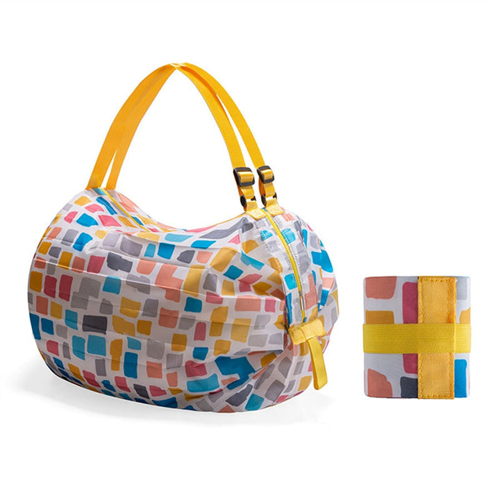 Women's large foldable shopping tote bag made from durable Oxford fabric, perfect for groceries and travel.