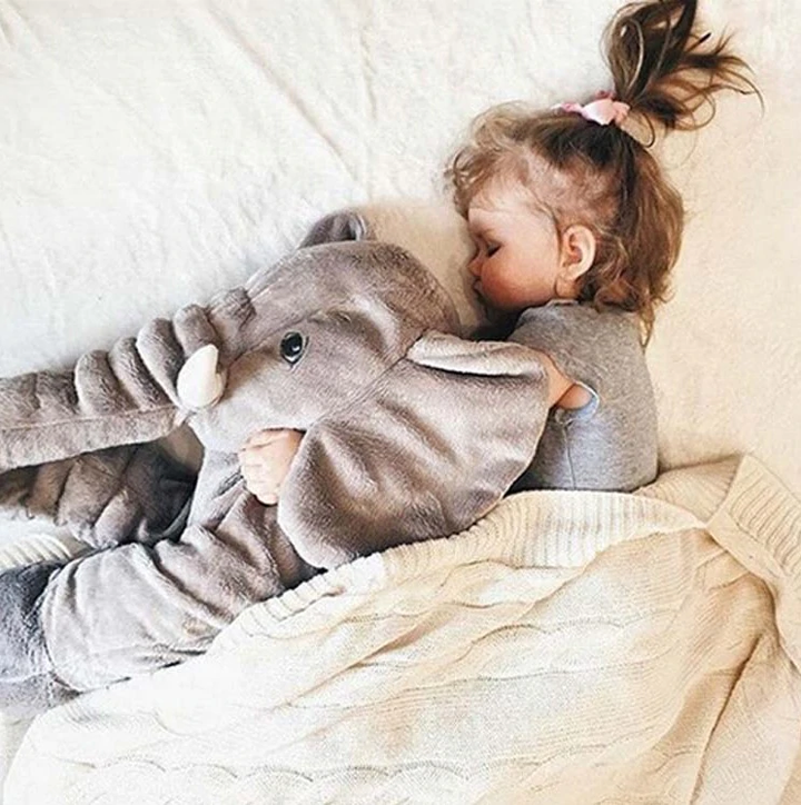 Chubby baby elephant plush pillow, extra soft & comforting for nursery, ideal for sleepy snuggles.