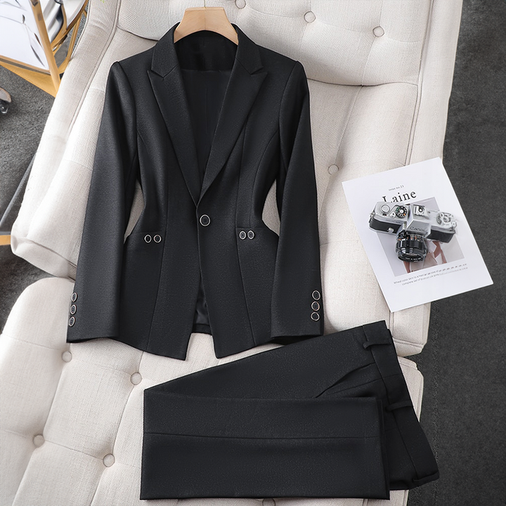 Formal women's blazer and pant set. This elegant two-piece is perfect for professional meetings & sophisticated events.