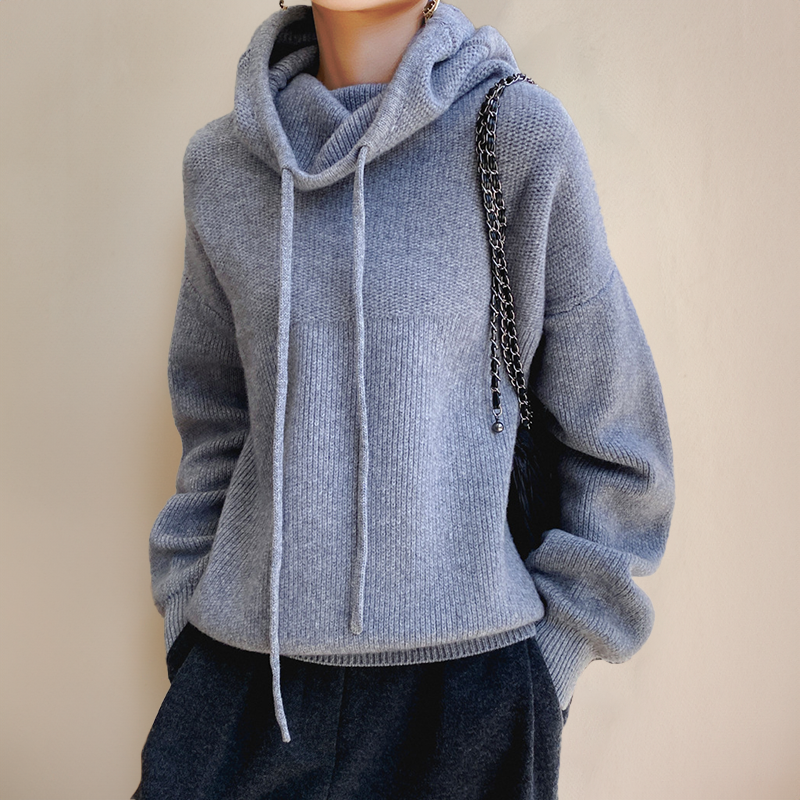 Versatile women's high-neck sweater, ideal as a casual chic top or elegant winter wear.