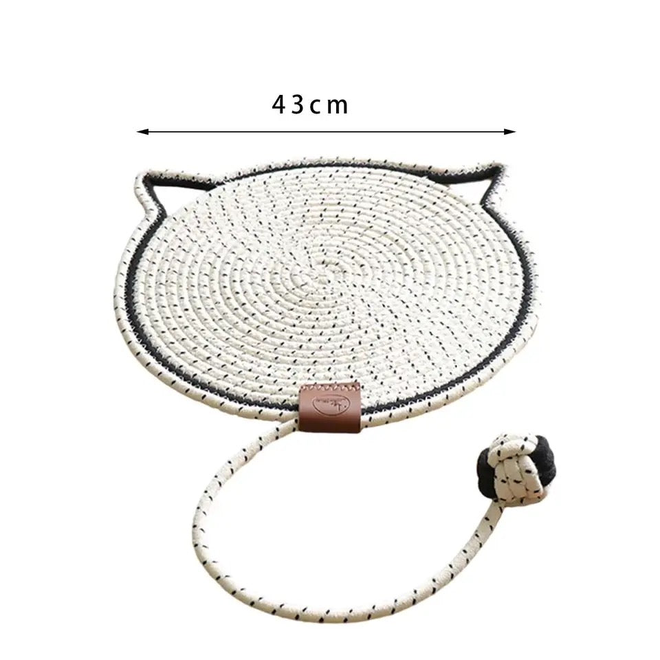 Sisal cat scratching rug, a durable furniture protector. Encourages healthy scratching habits.