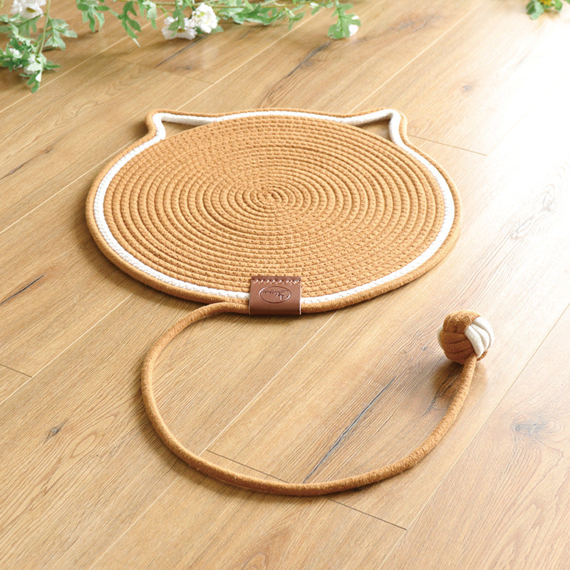 Textured sisal cat scratching rug, a durable furniture protector. Perfect for feline nail care.
