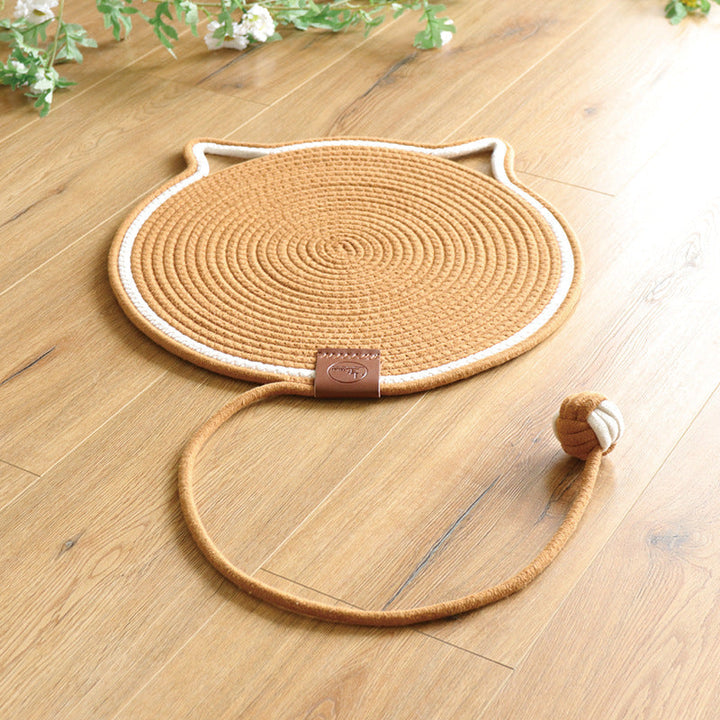 Textured sisal cat scratching rug, a durable furniture protector. Perfect for feline nail care.