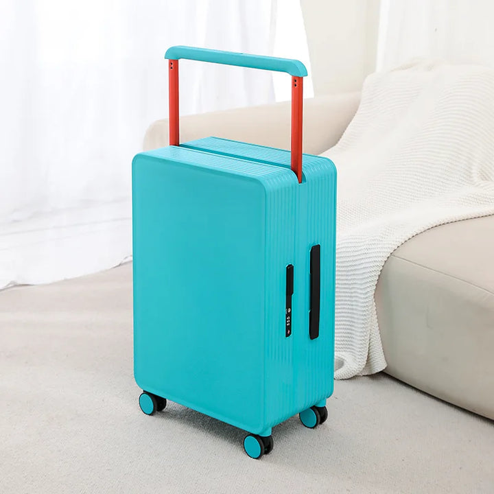 Close-up of the textured hard shell and robust spinner wheels on the Dublin travel suitcase.