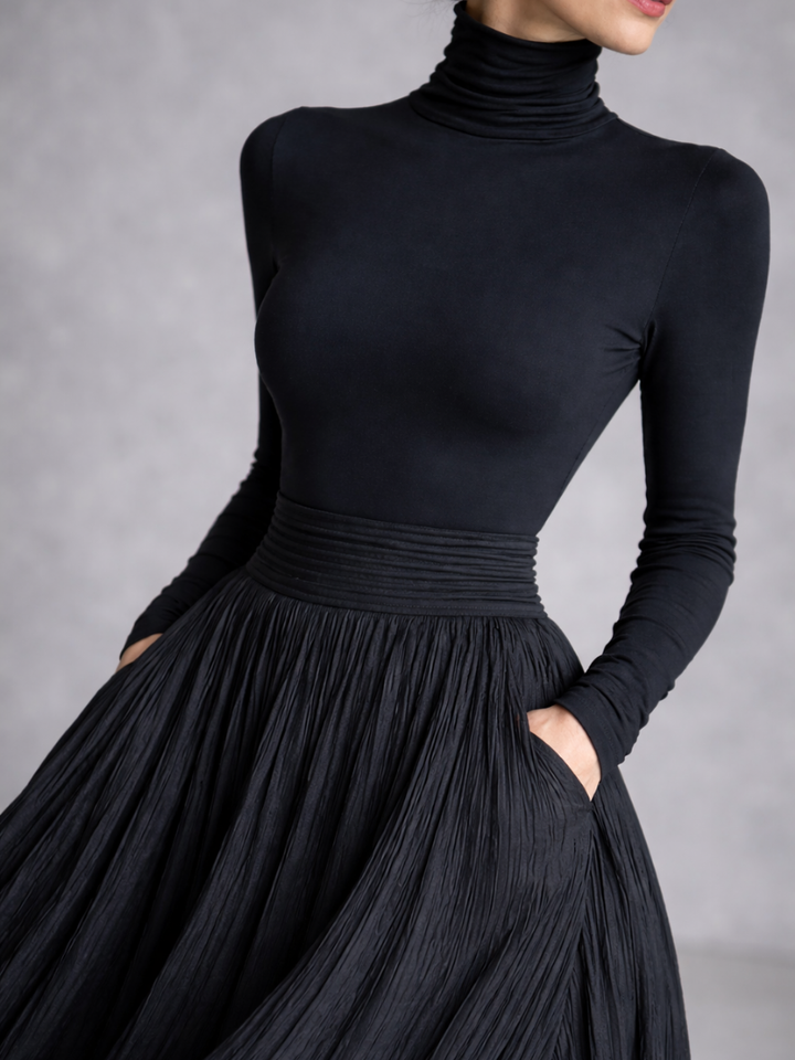 Winter women's elegant maxi dress featuring a chic turtleneck, long sleeves, and a flowing pleated skirt.