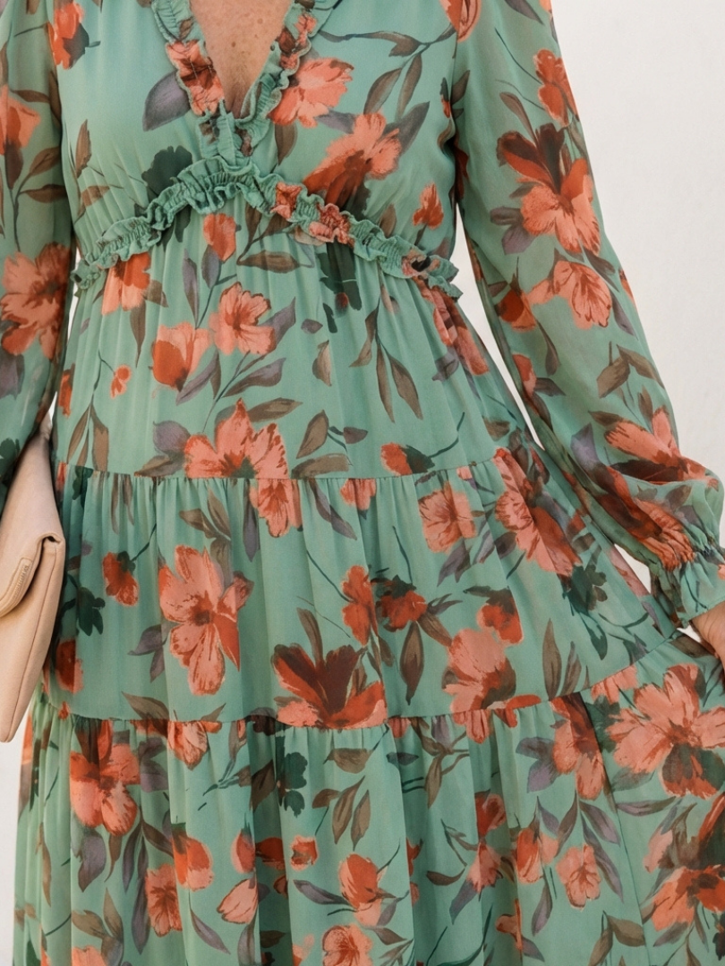 Elegant flowy long sleeve floral maxi dress for women, featuring a flattering V-neck, ideal for any occasion.