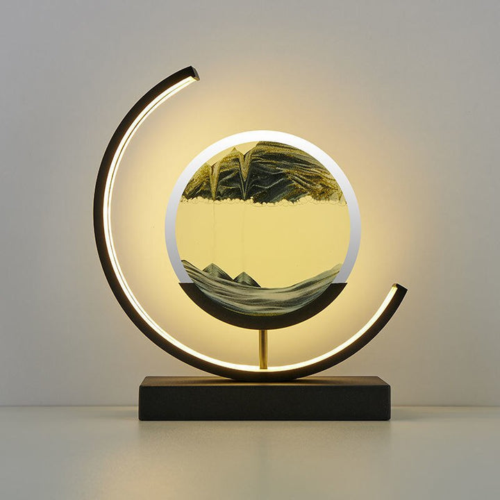 Dynamic Sand Art LED Table Lamp with flowing sandscapes and soft lighting, perfect for home or office decor transformation.