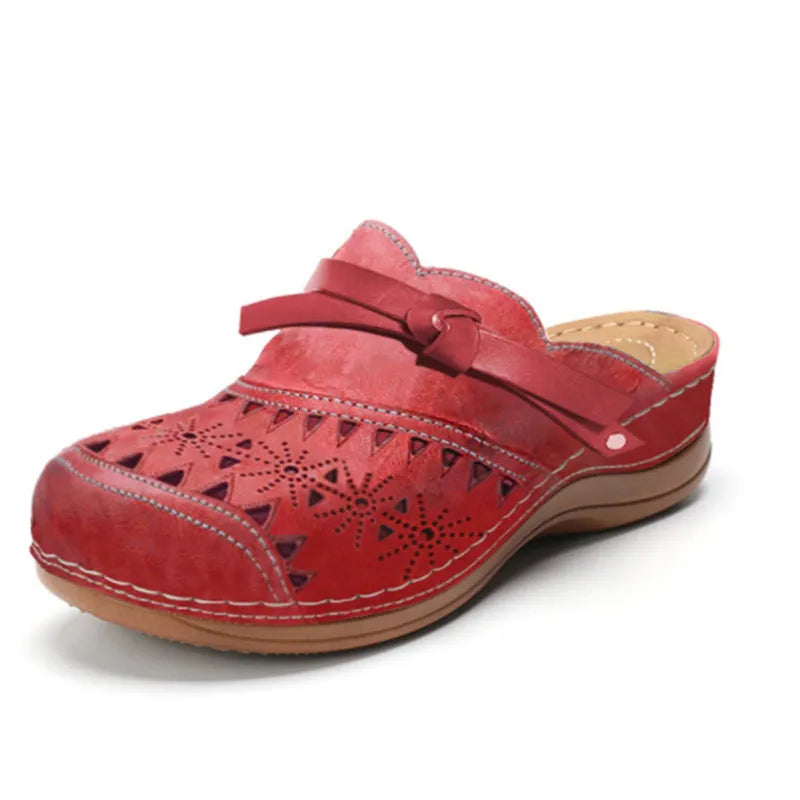 Orthopedic clogs for women, designed for foot pain relief & all-day comfort with a breathable perforated upper.
