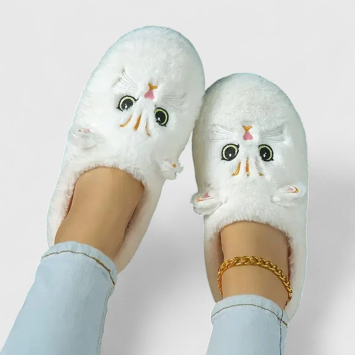 Side view of women's indoor slippers, highlighting plush lining and supportive sole.