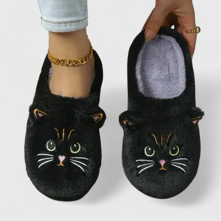 Close-up of women's cozy comfort slippers, plush interior, and arch support for indoor wear.