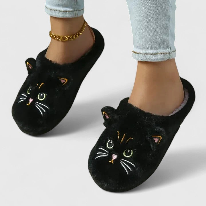 Pair of women's soft house slippers with all-day arch support, perfect for home comfort.