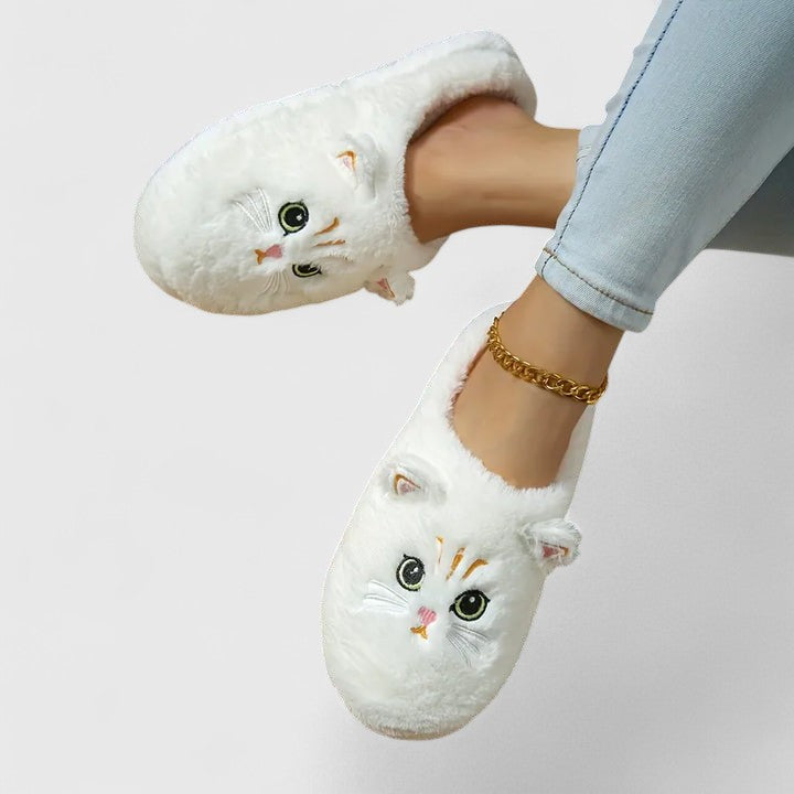 Comfortable women's house slippers with a non-slip outsole, great for hardwood floors.