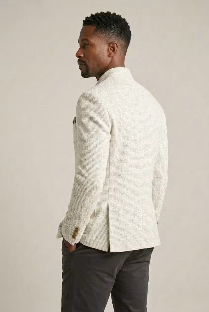Elegant men's single-breasted textured blazer with mandarin collar, ideal for sophisticated evening wear.
