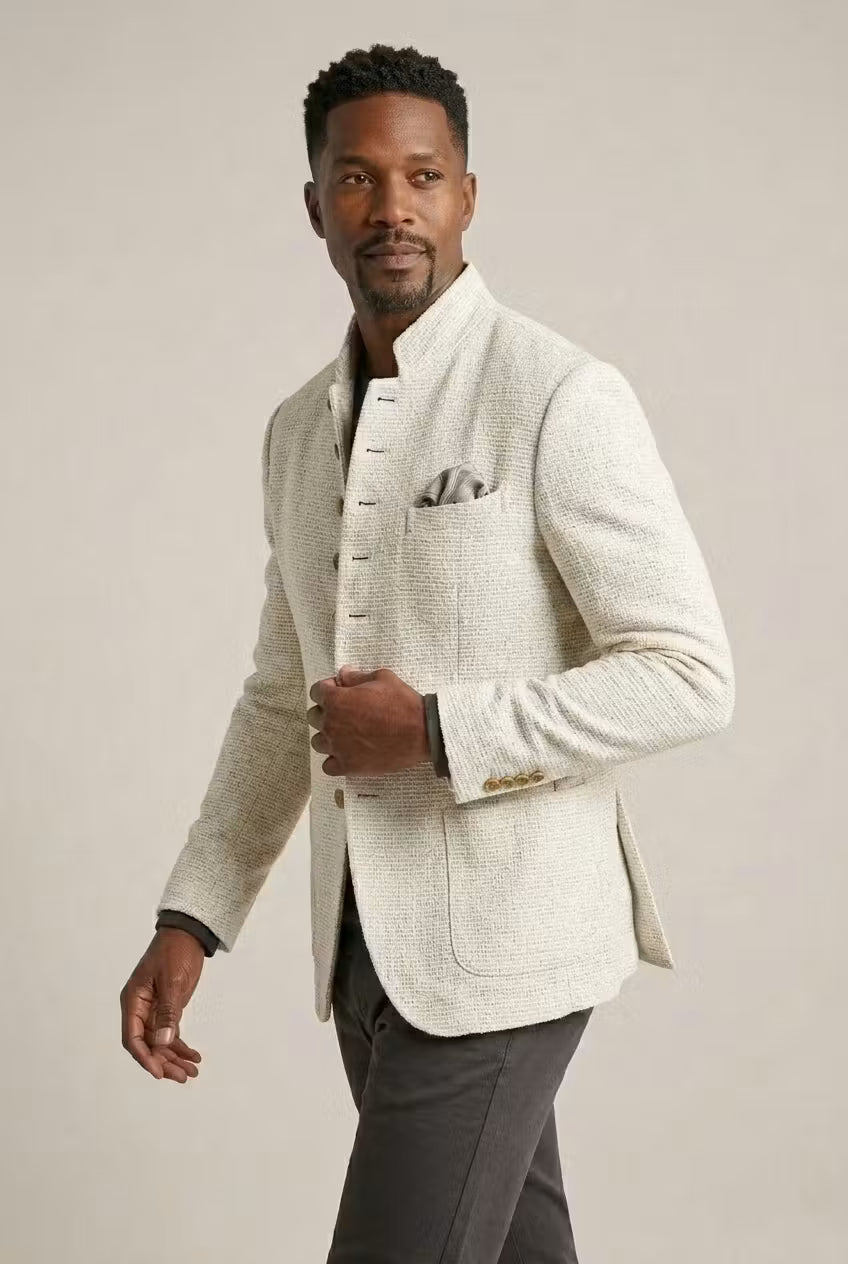 Stylish men's fashion blazer featuring a modern mandarin collar and textured fabric, structured fit.