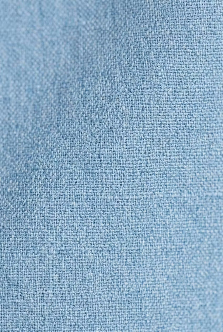 Comfortable men's chambray button-up. Relaxed fit, long sleeve for effortless casual & smart casual style.