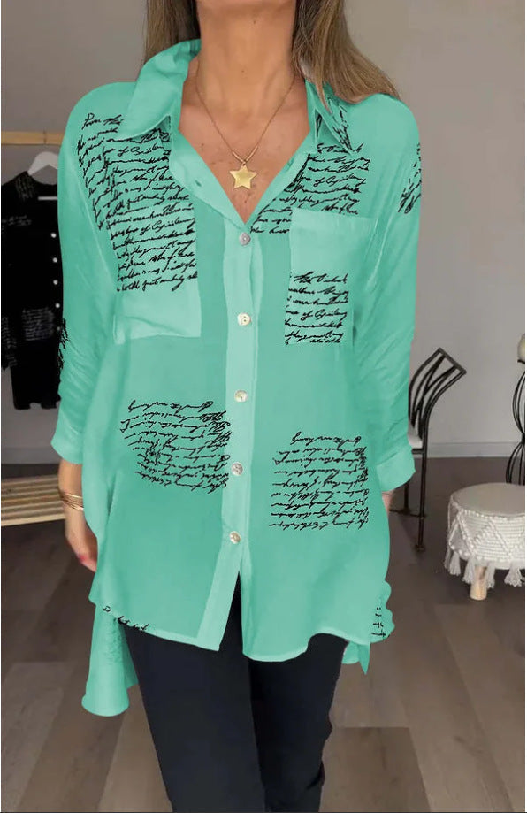 Versatile women's oversized script print button-up shirt. Elegant long sleeve top for everyday fashion and comfortable wear.