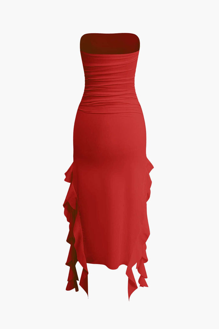 Women's strapless party dress, bodycon silhouette, and a fashionable fringe hem detail.