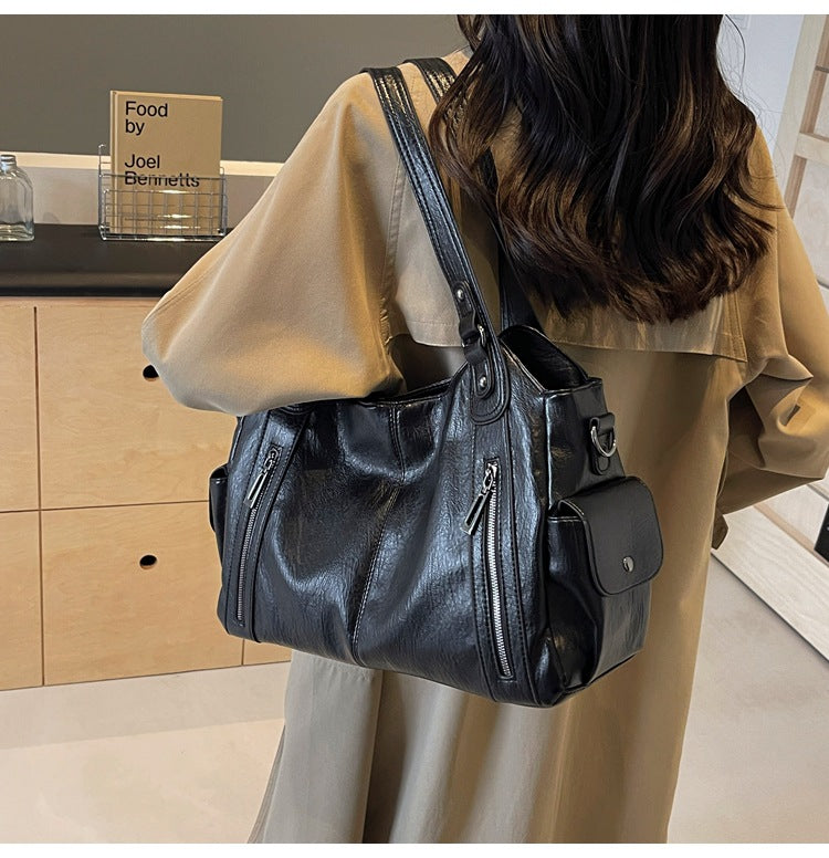 Stylish women's work bag: a large faux leather tote, perfect as a practical shoulder handbag.