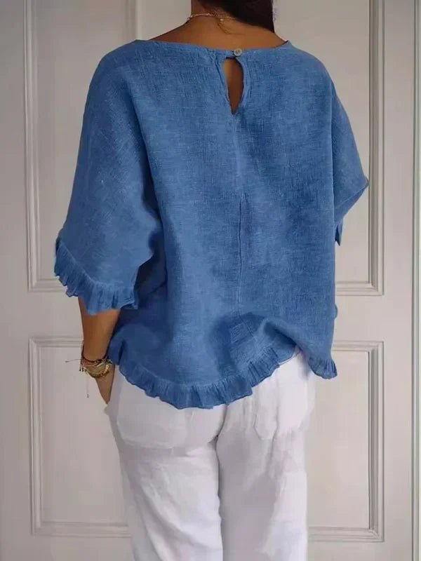 Elegant women's ruffle shirt blouse, perfect for stylish comfort on any occasion. Long sleeve, versatile fashion.