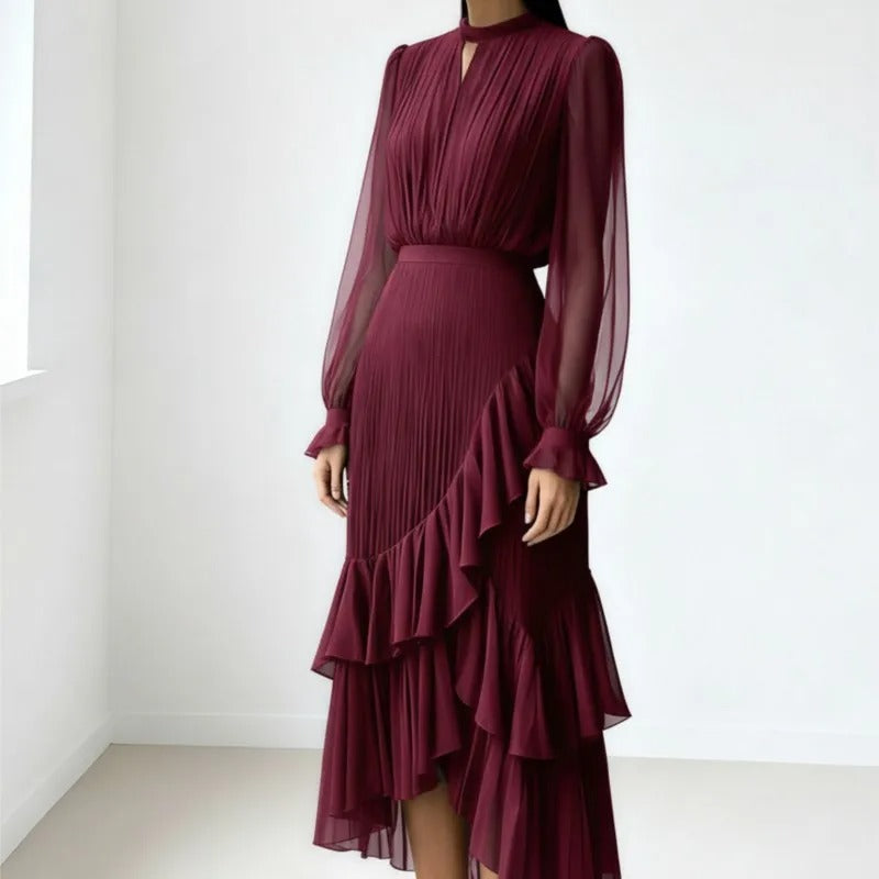 Chic women's party midi dress, featuring delicate pleats and a flowing, elegant design.