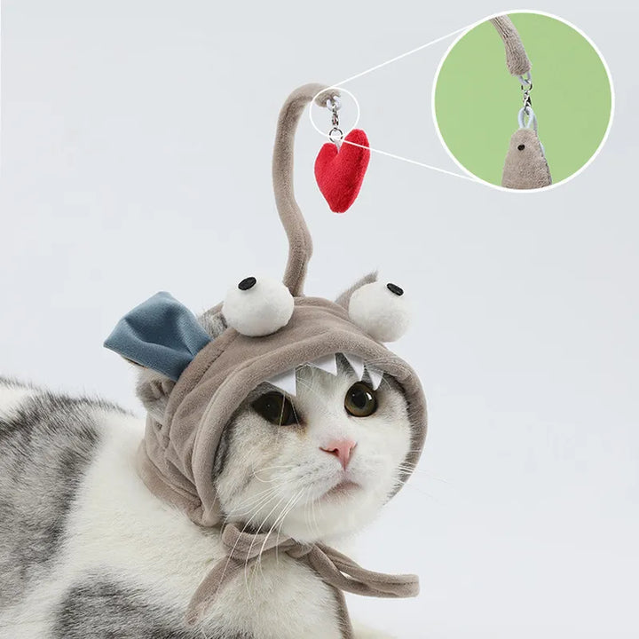 Soft cat hat costume with a feather toy, an engaging pet accessory for active cats.