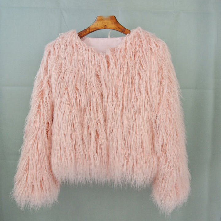 Elegant warm women's winter outerwear. Stylish long-sleeve coat, perfect for cozy autumn and winter fashion.