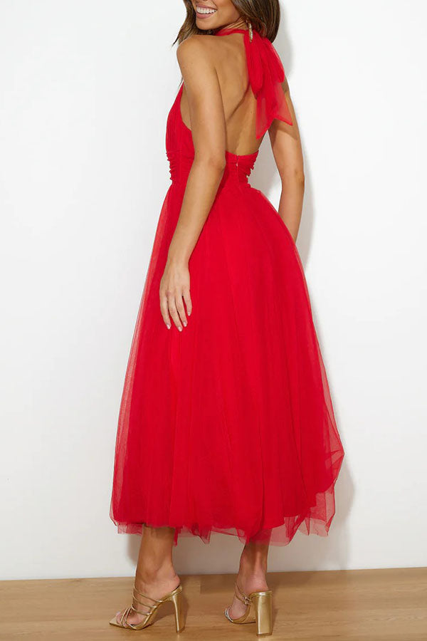 Sophisticated sleeveless midi dress for women, an elegant choice for evening events.